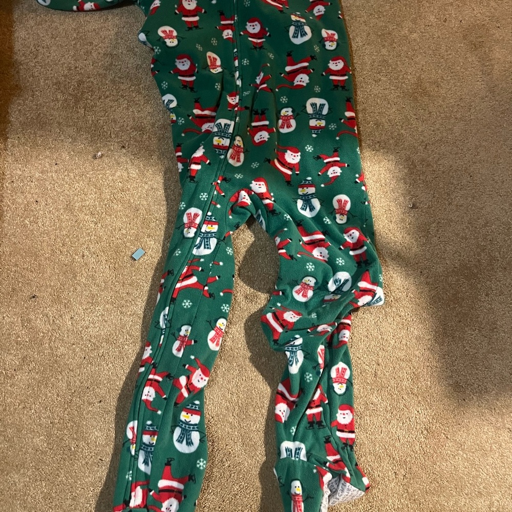A like new pair of Christmas pajamas with footies.